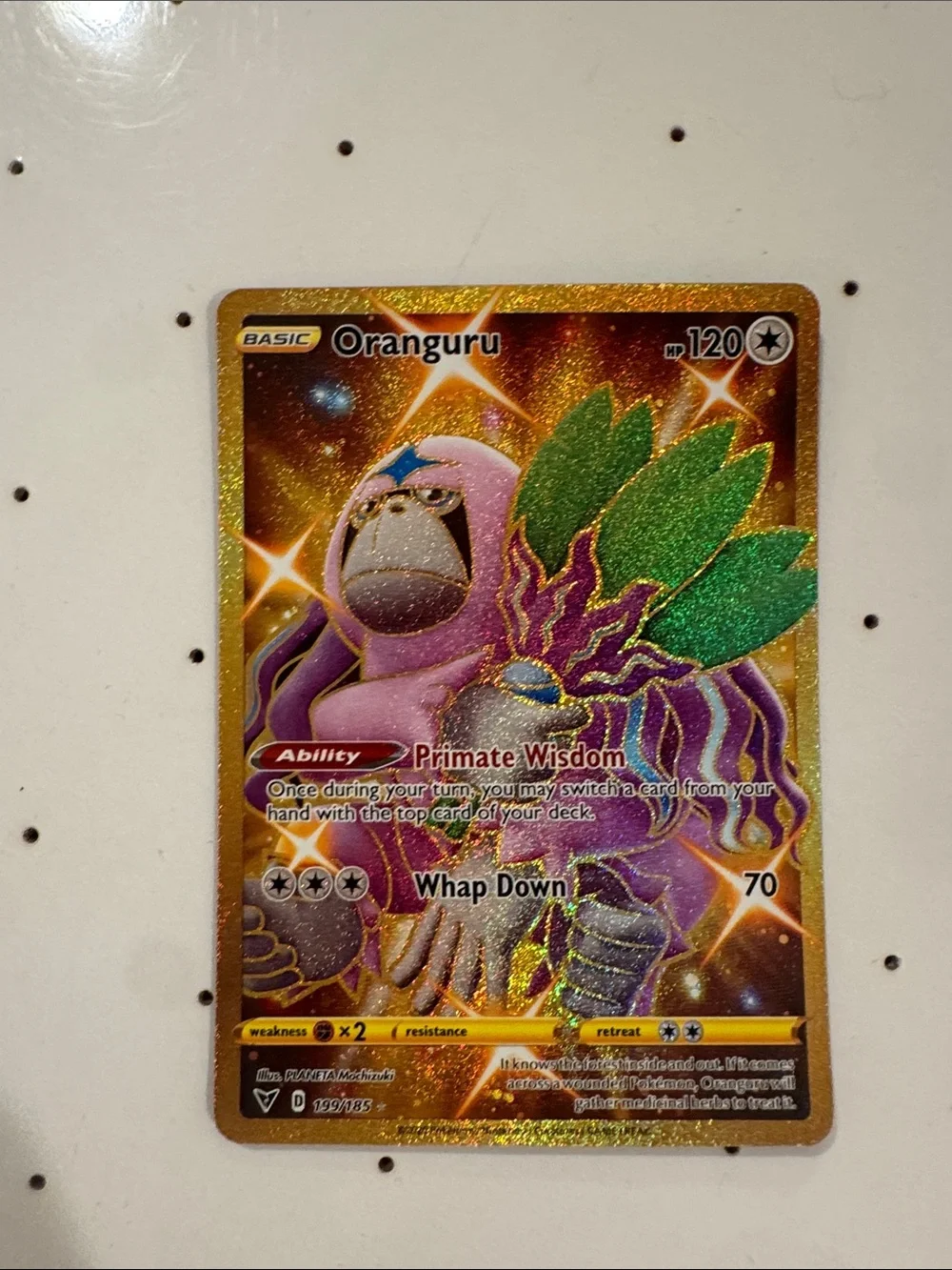 Pokémon Oranguru Holofoil Card - Gold, Purple & Green